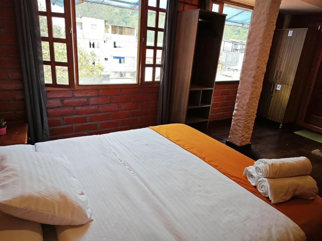 Garden House Hostal Baños Buitenkant foto