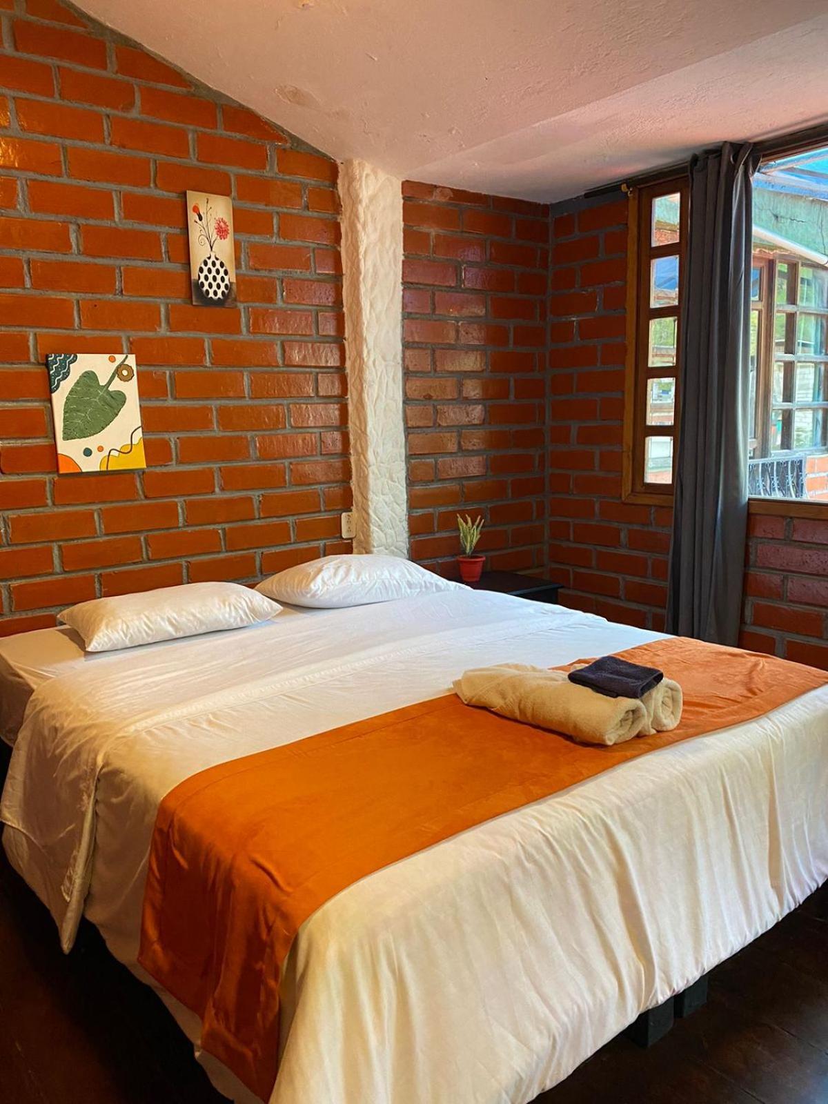 Garden House Hostal Baños Buitenkant foto